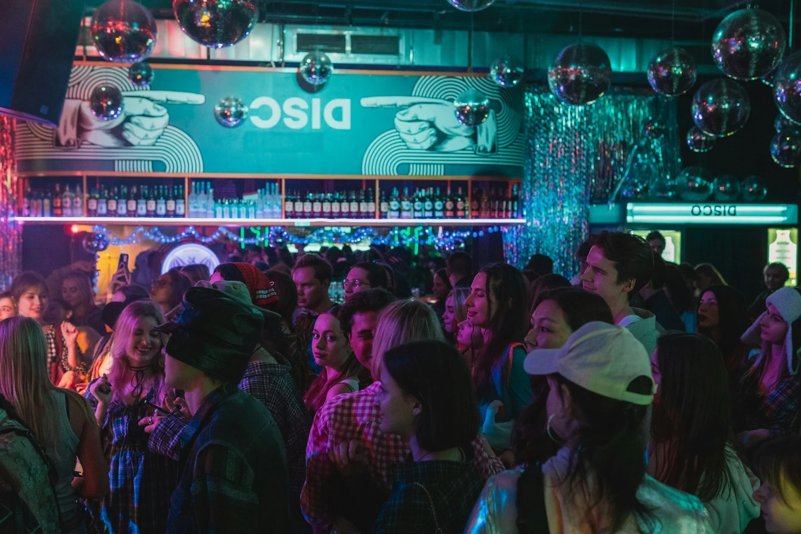 Nightlife in a club. Context photograph; it does not depict a spiking incident.